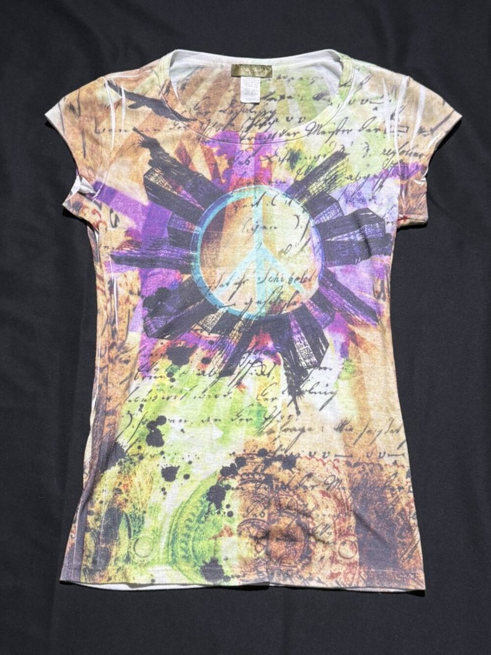 Cleo Casual Womens Y2K-era "grunge-sleaze" graphic baby tee Medium Multicolored